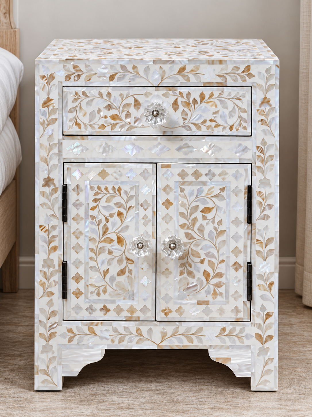 Handmade white Mother of Pearl bedside cabinet with floral inlay, one drawer and two doors