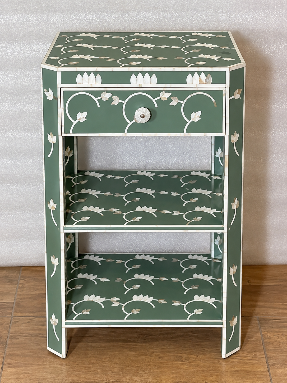Sage green Mother of Pearl bedside table with floral inlay, one drawer and two open shelves